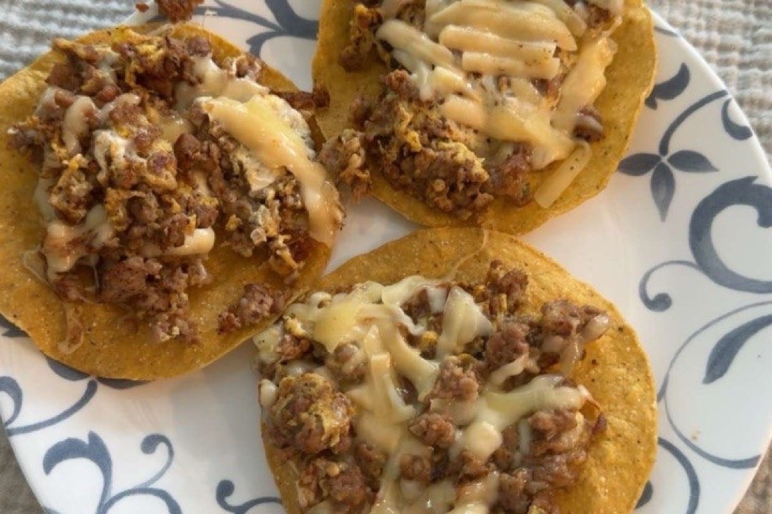 Breakfast tostadas with sausage, egg and cheese, cooked by Abraham L.
